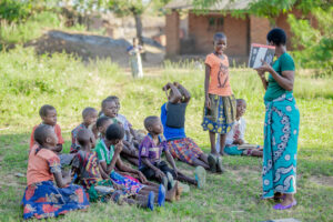 Children being taught outside